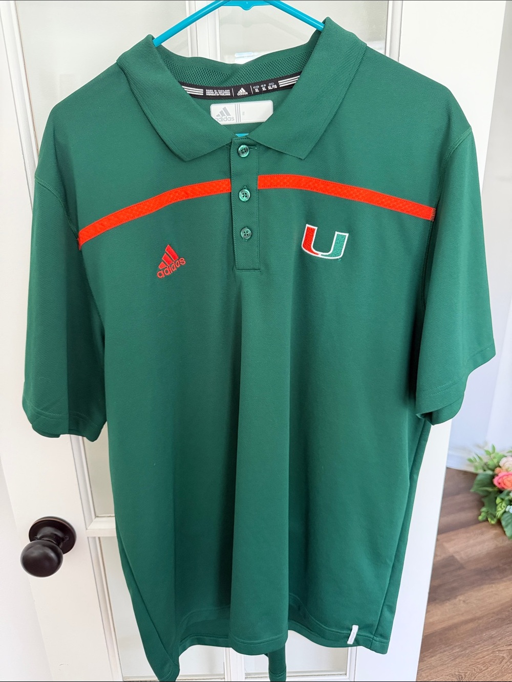adidas Men’s Green Polo with Orange Accents and Miami U Logo